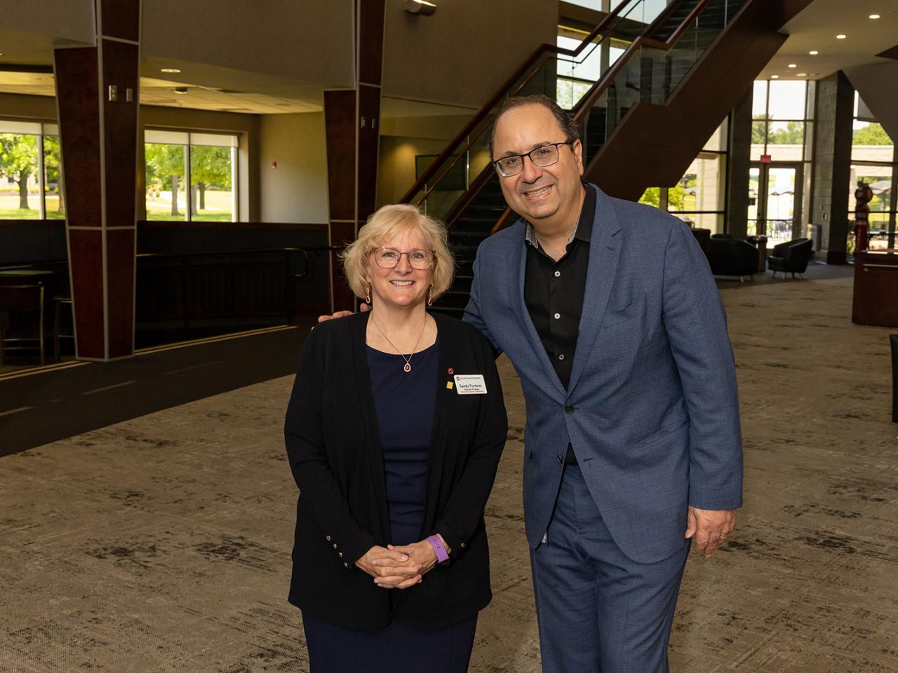 Portrait of Keyvan Esfarjani, Executive Vice President & Chief Global Operations officer at Intel Corporation with Sandy Furterer, Professor of Practice, Integrated Systems Engineering at The Ohio State University 