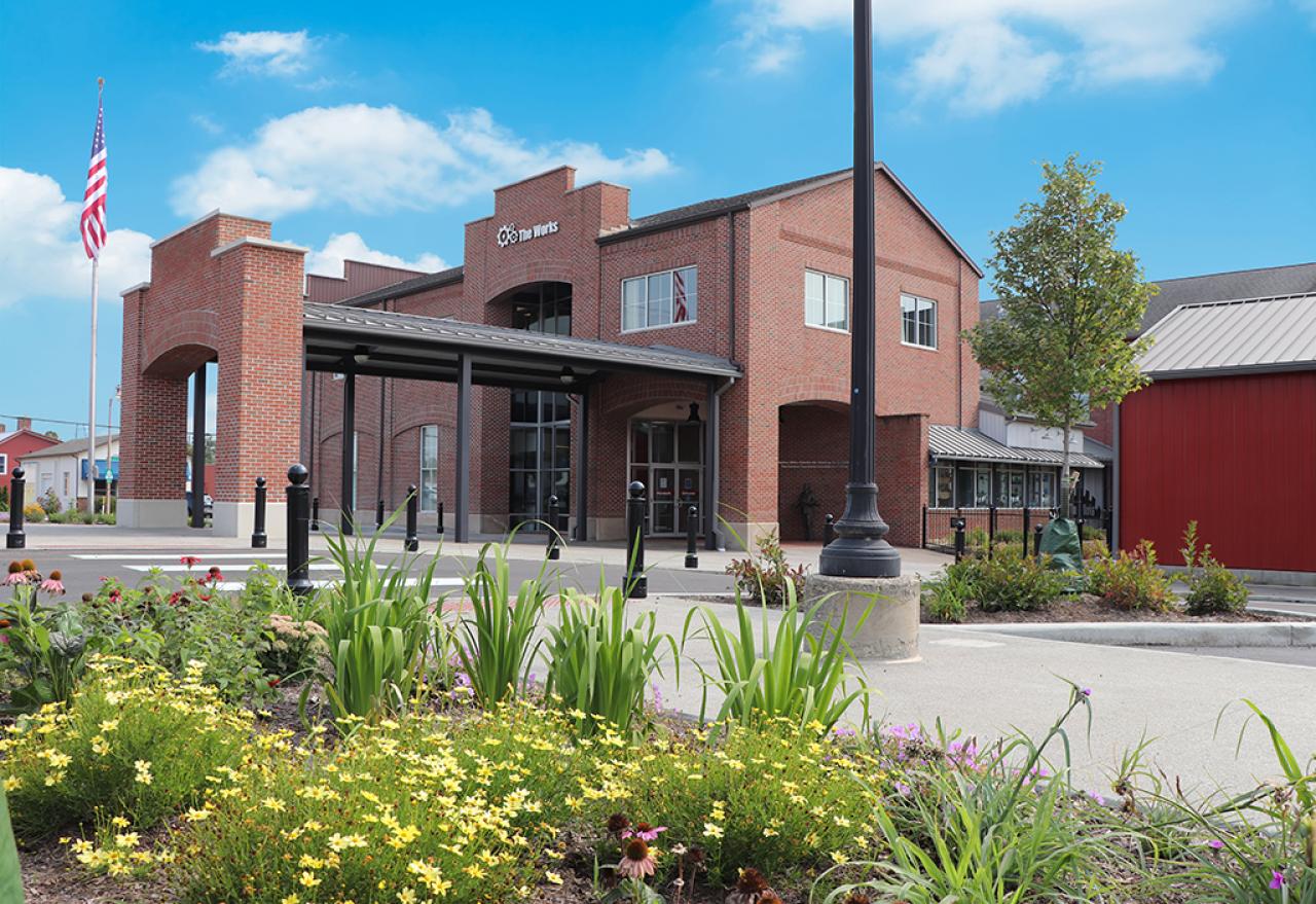 Exterior of The Works, a brick two-story building.
