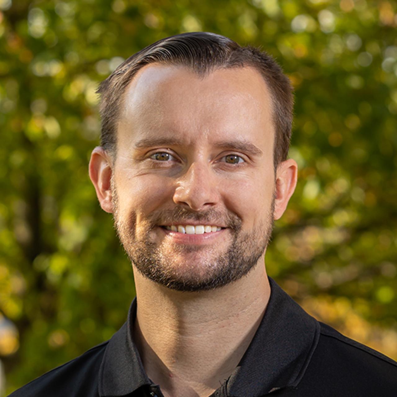 Headshot of Wes Grunden, directory of enrollment.