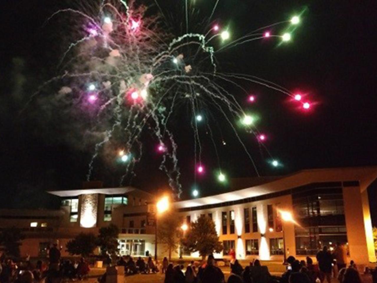 Fireworks exploding over the Newark Campus