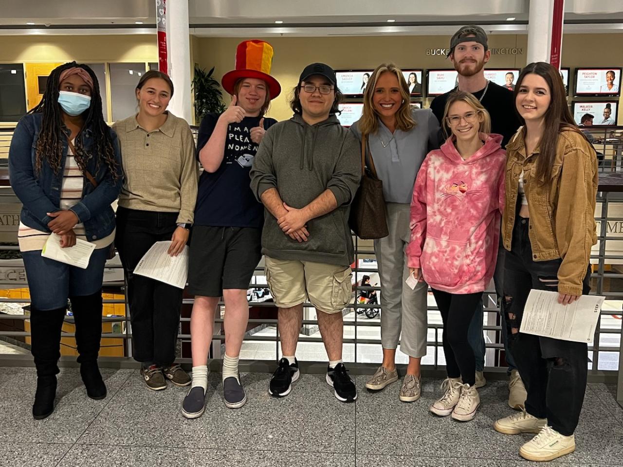 Students stand side-by-side posing for a photo.