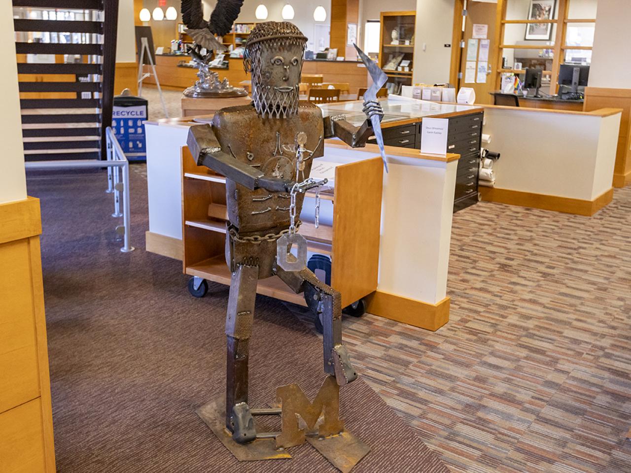 A 5-foot-tall metal statue of Zeus created by a student.