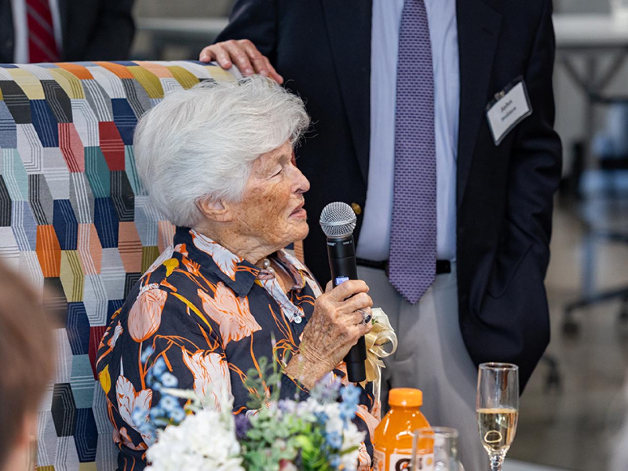 Mrs. Louella Reese attends a brunch reception for the opening of the building named in her honor.