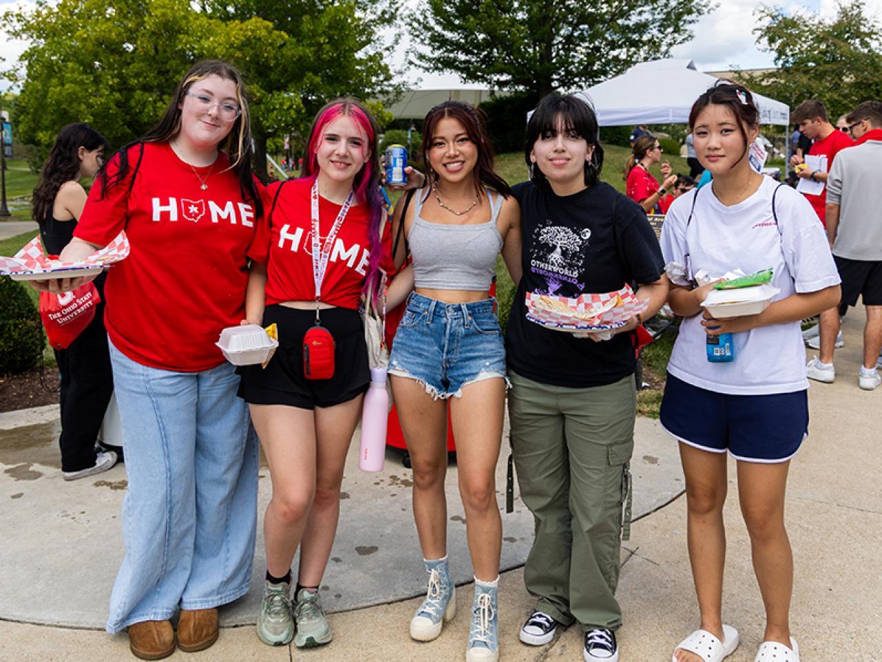 Group of OSU Newark students pose on campus following Convocation.