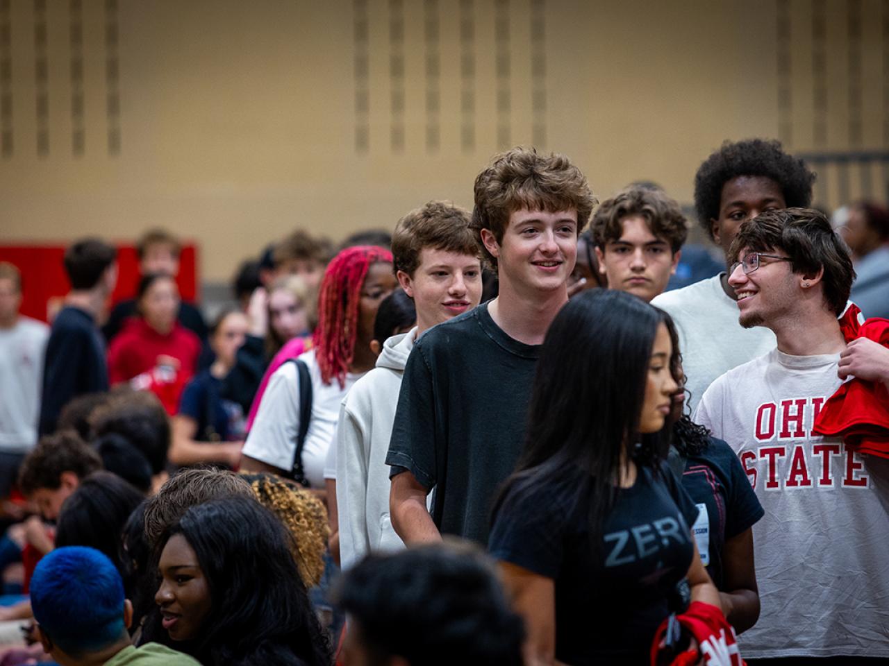 Students process into the gymnasium for Convocation.