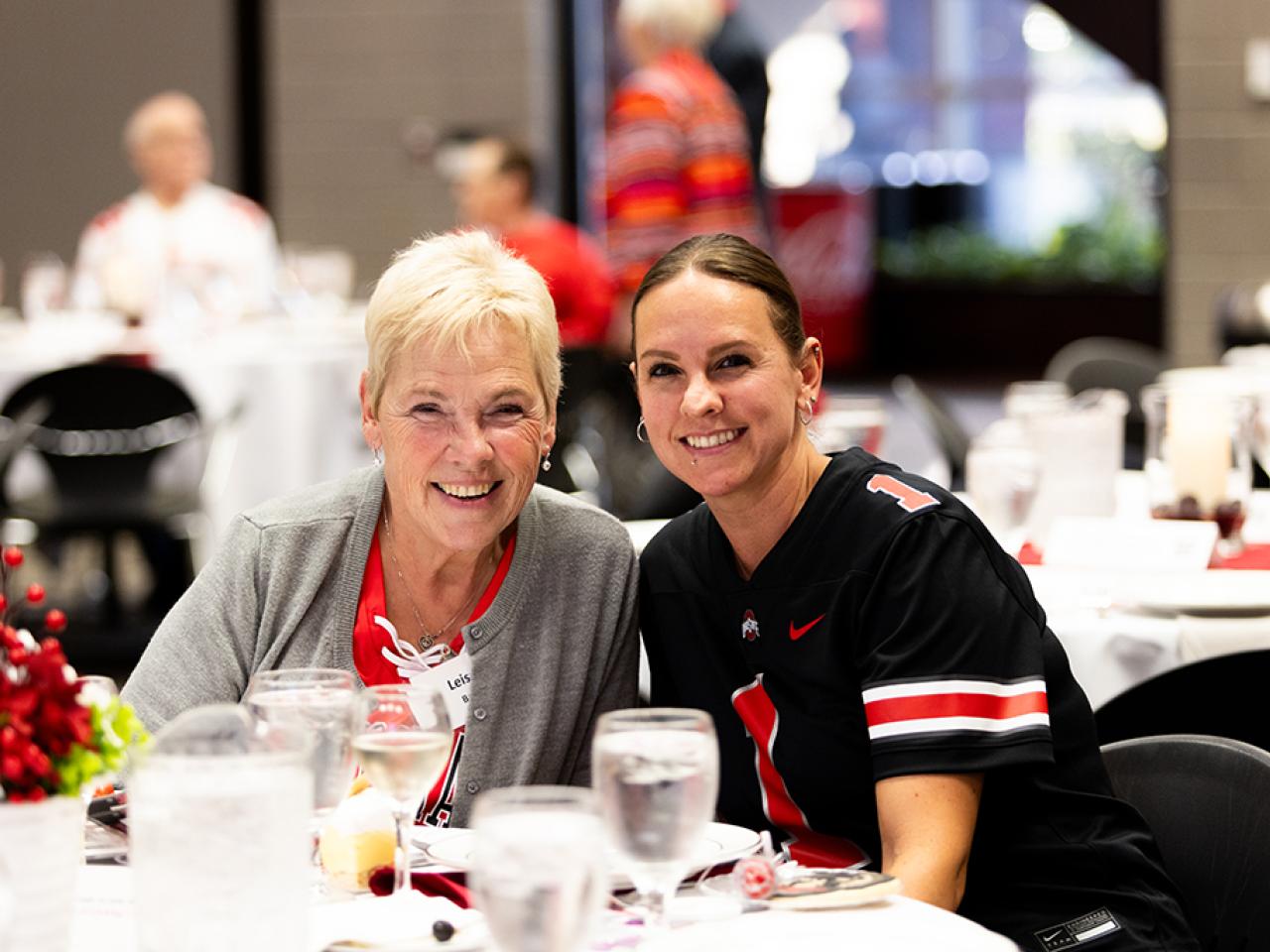 Guests converse during the alumni Homecoming celebration in the Reese Center.