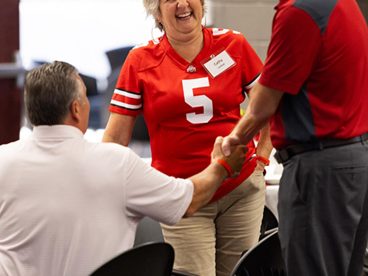 Guests converse during the alumni Homecoming celebration in the Reese Center.