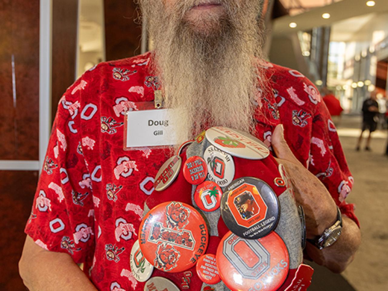 A guest wears scarlet and gray Buckeye memorabilia.