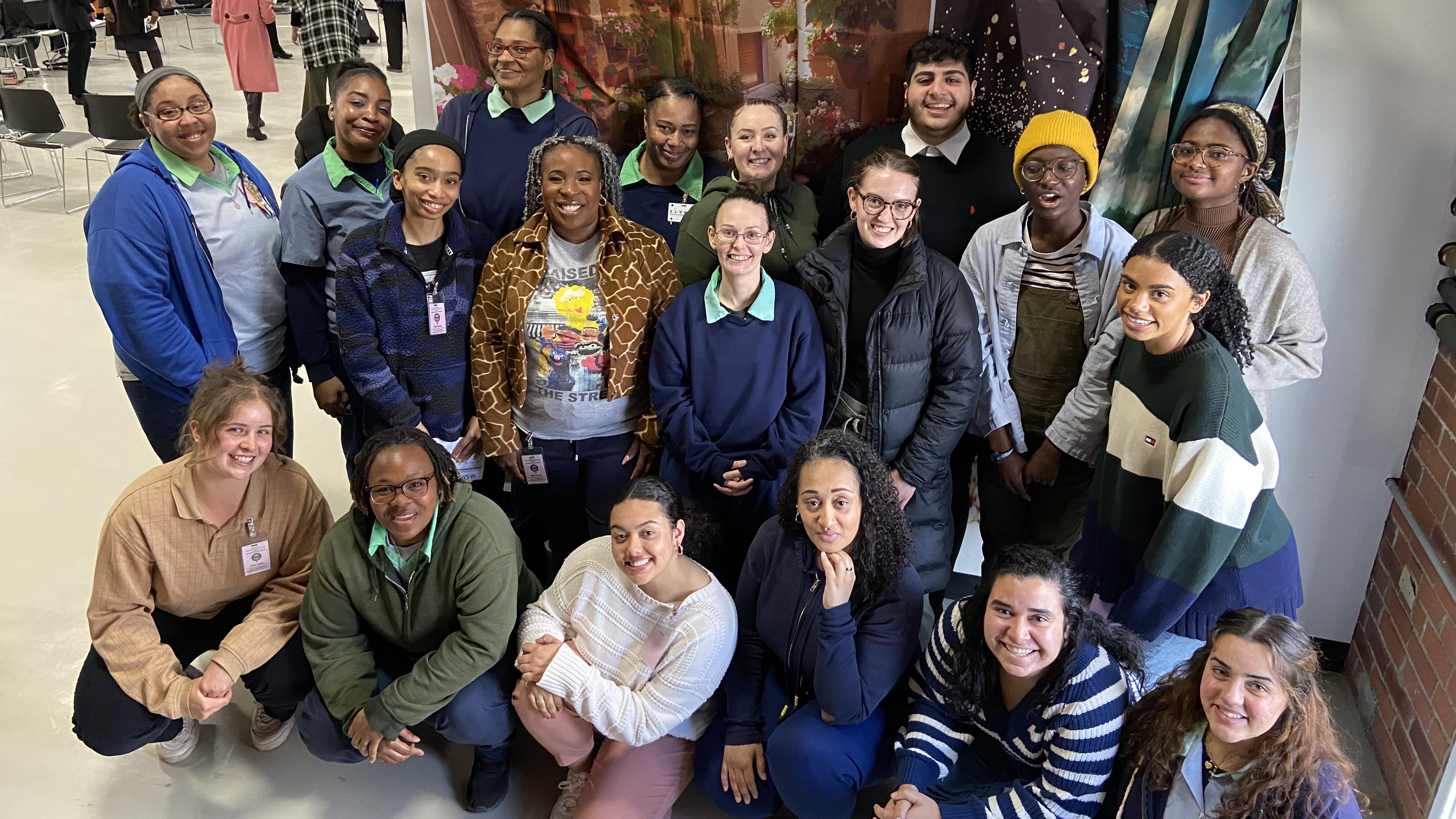 A group of 19 college and incarcerated students gather for a picture while attending class at the Ohio Reformatory for women.