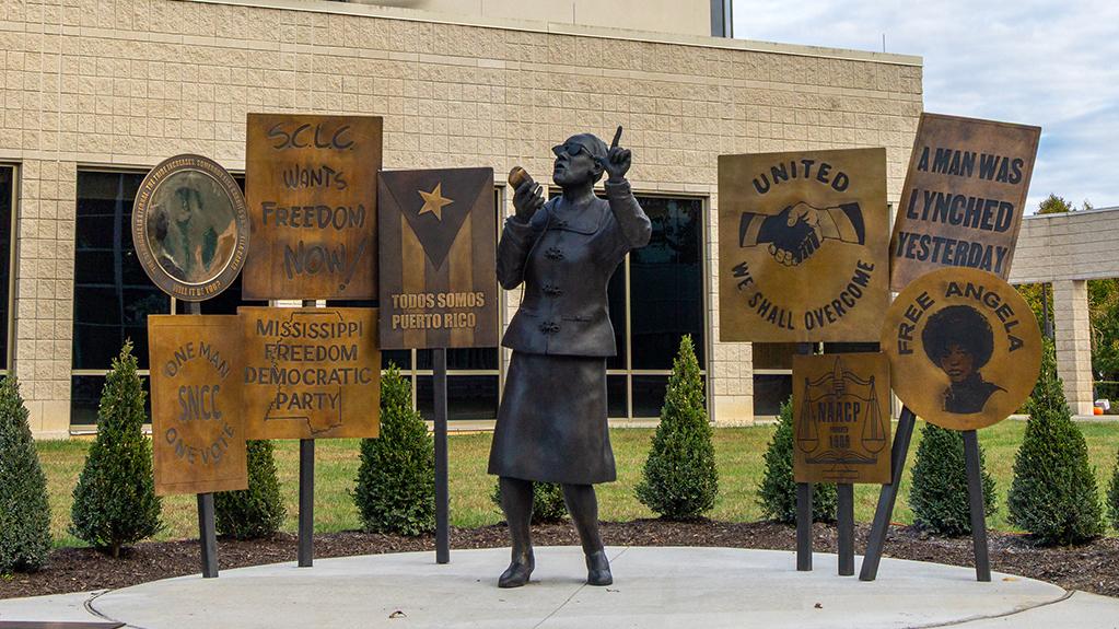 A life-size bronze statue of Civil Rights activist Ella Baker is installed on the campus adjacent to the Reese Center.
