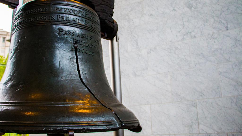 A close-up photograph of the Liberty Bell. 