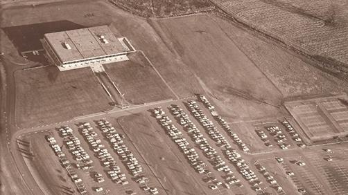Aerial view of the Newark campus in 1971 showing the lone Founders Hall building and one parking lot.