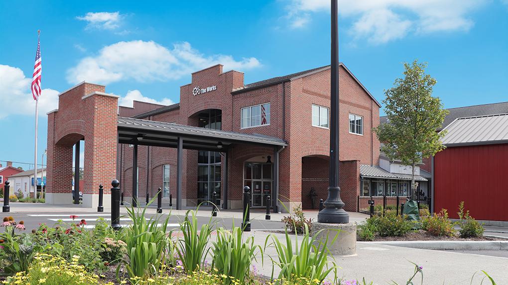 Exterior of The Works, a brick two-story building.