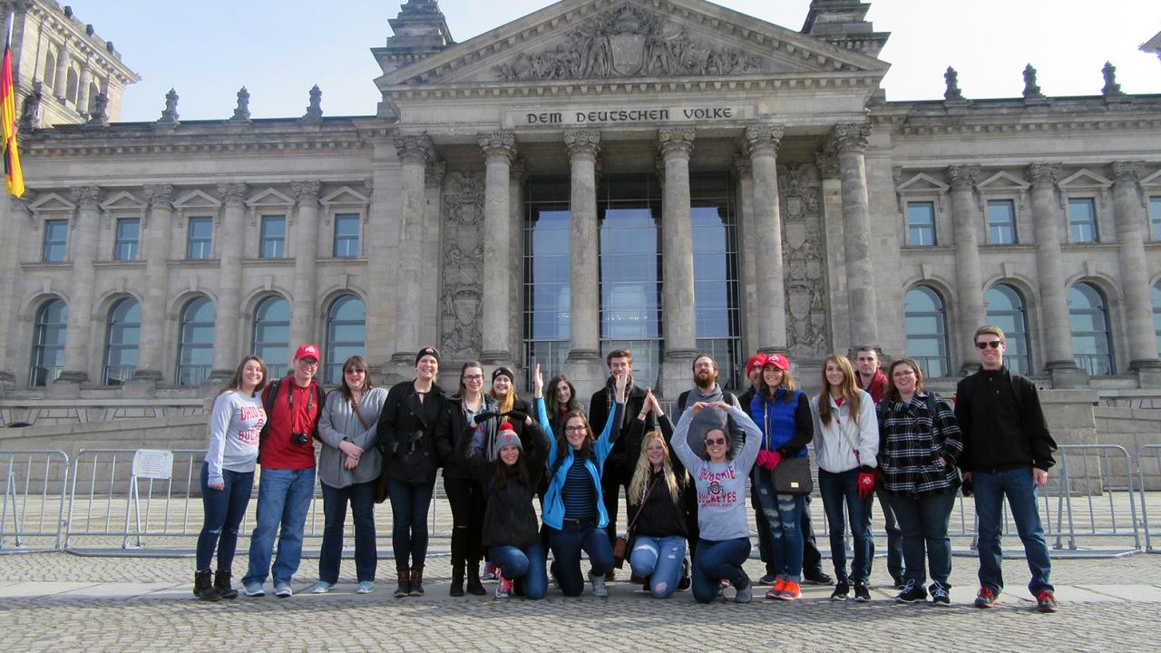 A group of students in front of the Reichstag building in Berlin, Germany.