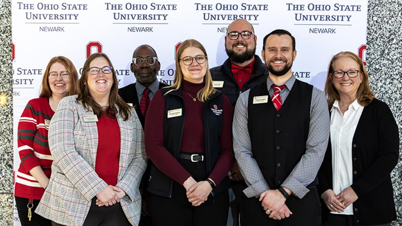 Admission staff stand together