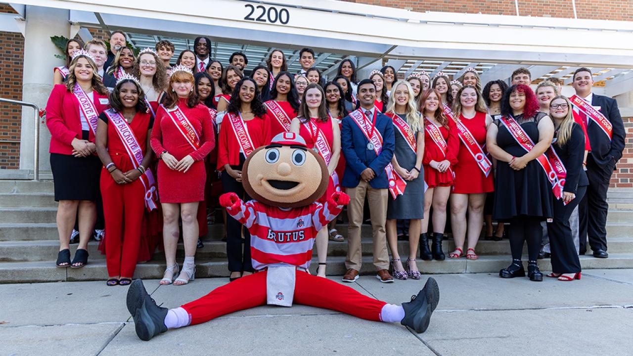 Ohio State regional campus Homecoming Court members with Brutus Buckeye outside the Longaberger Alumni House for the regional campus Homecoming recognition ceremony.
