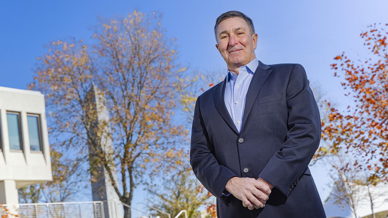Portrait of Brad Shumaker standing outside on the campus of Ohio State Newark.