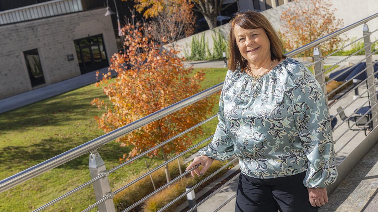 Portrait of Jodie Wheeler standing outside on the campus of Ohio State Newark.